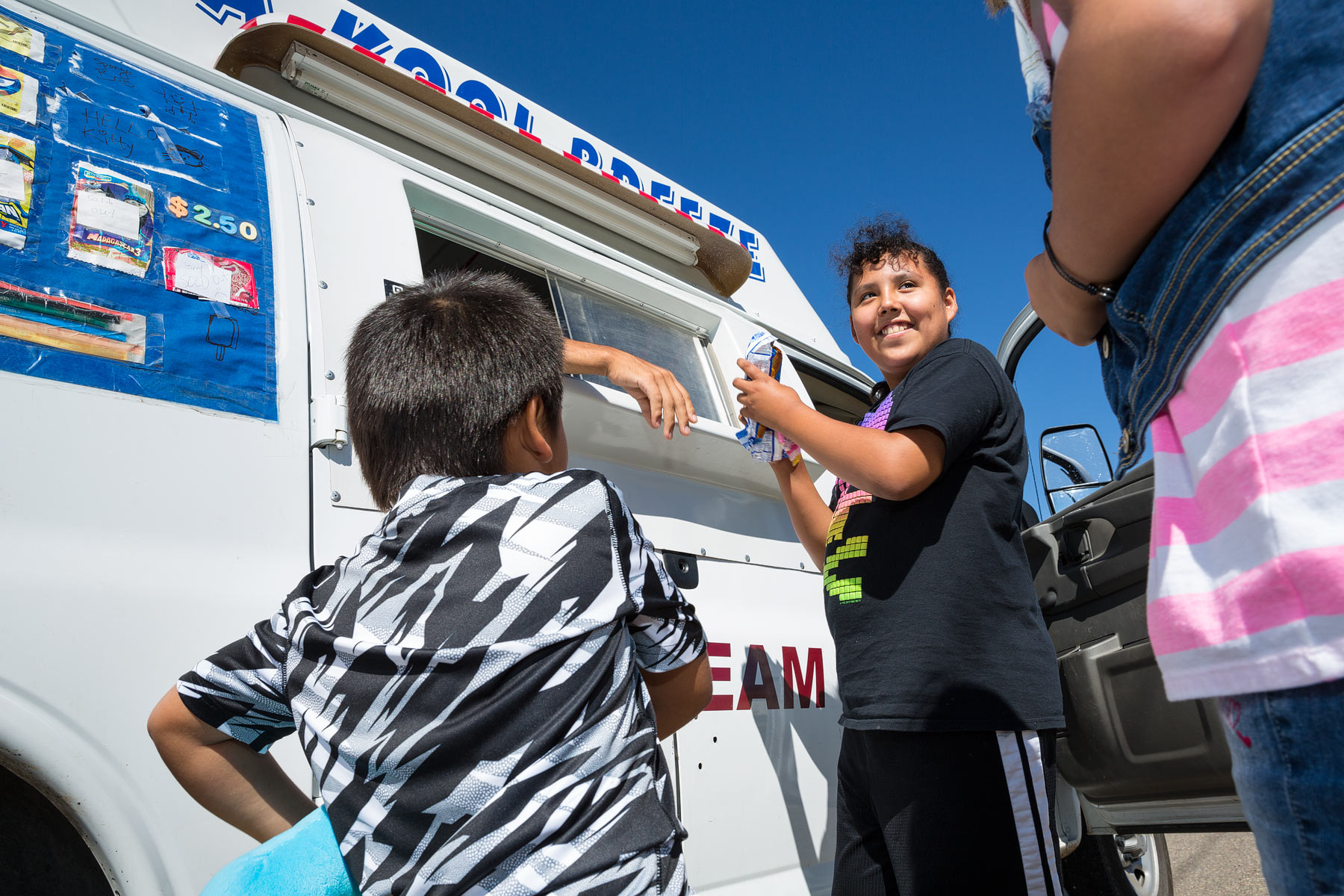 Browning kids are thrilled for the arrival of the Kool Breeze Ice Cream Truck on their street.
