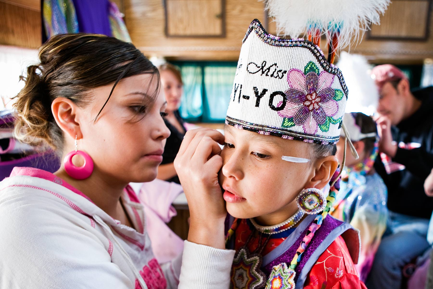 Mother Tiffany Polk prepares her daughter, Danaya Vandeburg for the Tiny Tot Competition
North American Indian Days
Browning, Montana
Blackfeet Reservation
