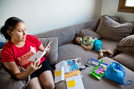 Heather organizes the family bills and expenses.